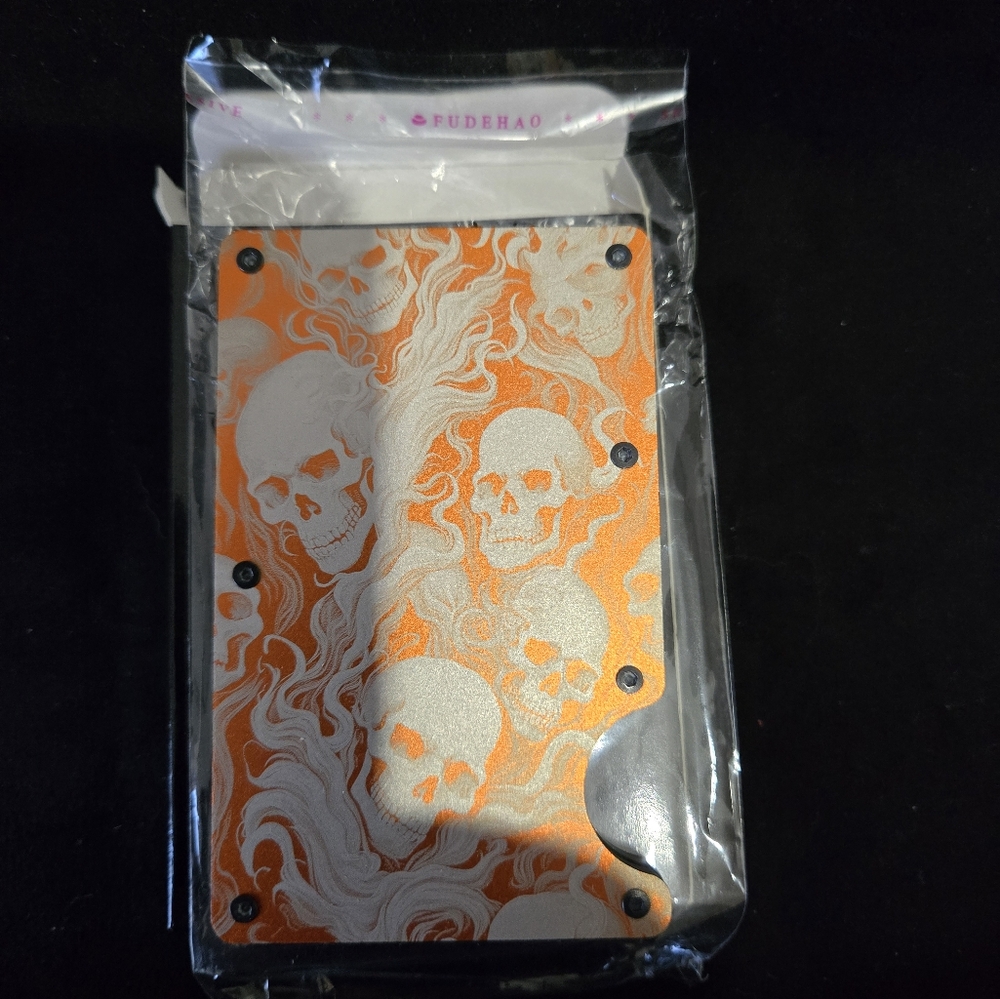 Metal minimalist RFID blocking wallet laser engraved Skulls.